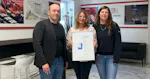 The photo shows the certificate presentation at MINDA.