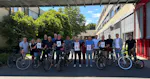 The photo shows the MovingMINDA team