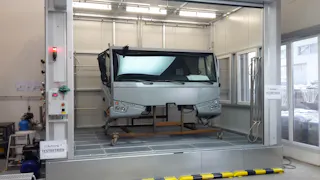 Leak test A cockpit as an individual part from a truck in a production plant
